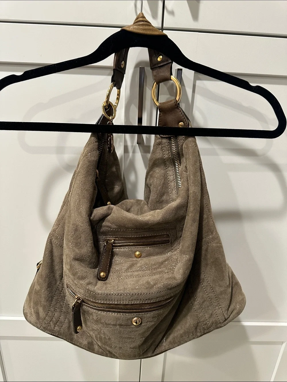Tod’s Soft Metallic Taupe Hobo Bag with Gold Hardware. Lots of pockets,